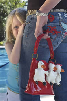 Young Girl with her Mother Purses and Passion Exhibit Image The Studio@620 